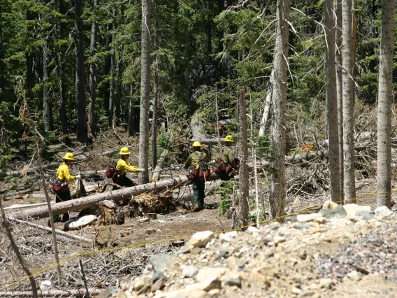 Firemen at aftermath of fire