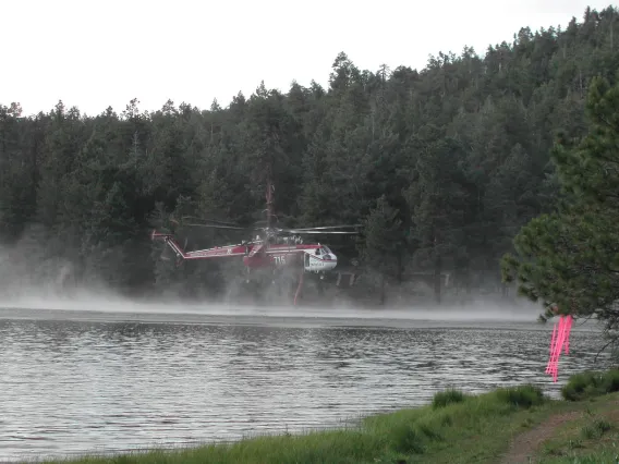 Helicopter coming down to water