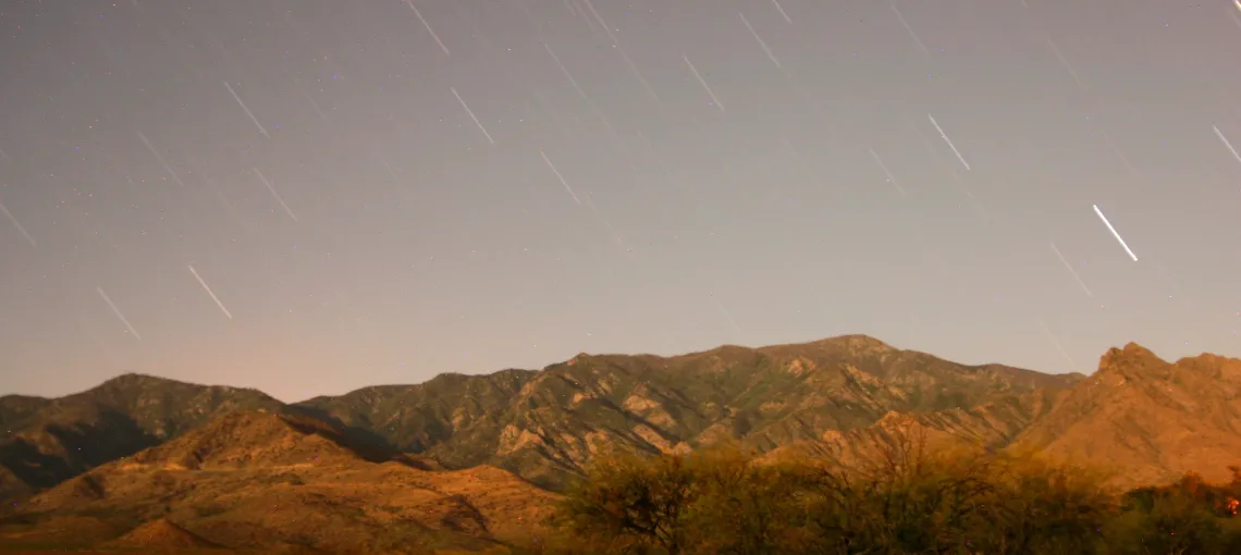 Star Trails Over Mount Graham, Illuminated by Moonlight