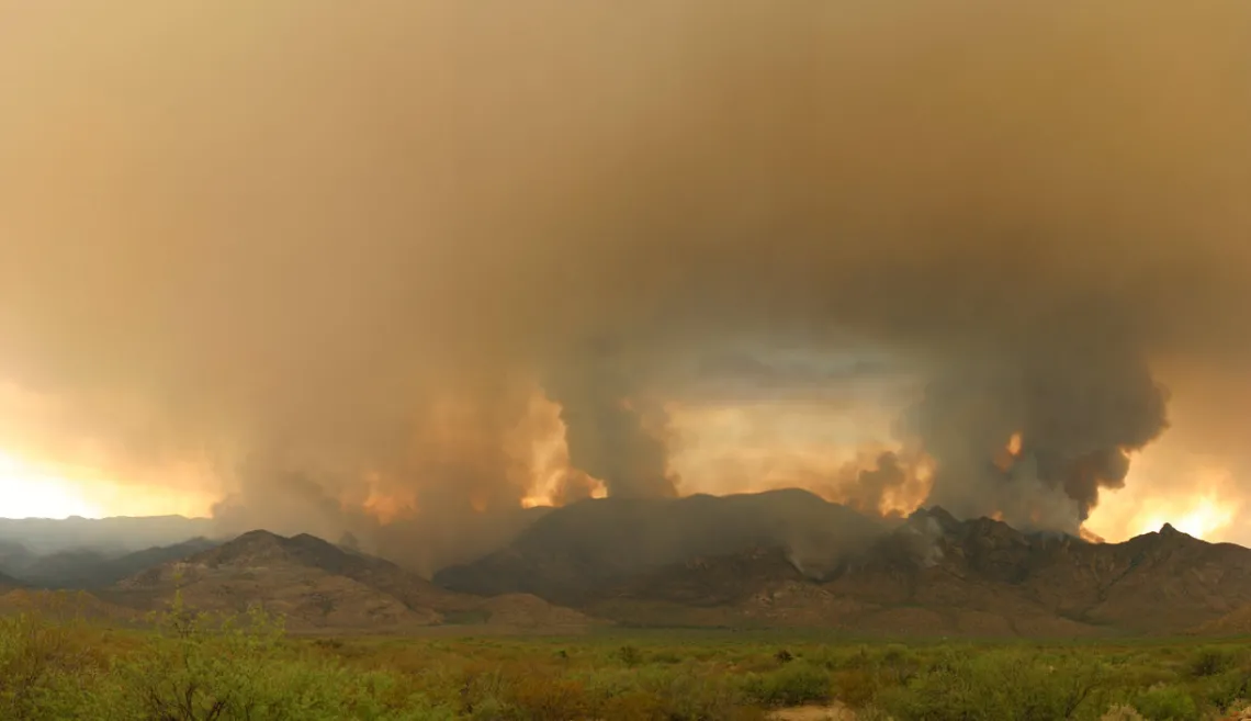 Mountain seen covered by smoke from a distance