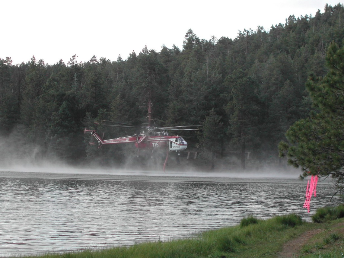 Helicopter coming down to water