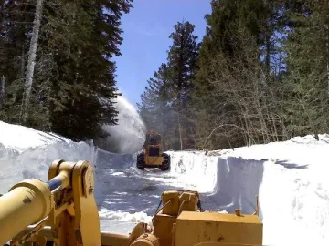 Snowblowing the road to the US Forest Service Columbine Work Center -- Photo by MGIO Crew.